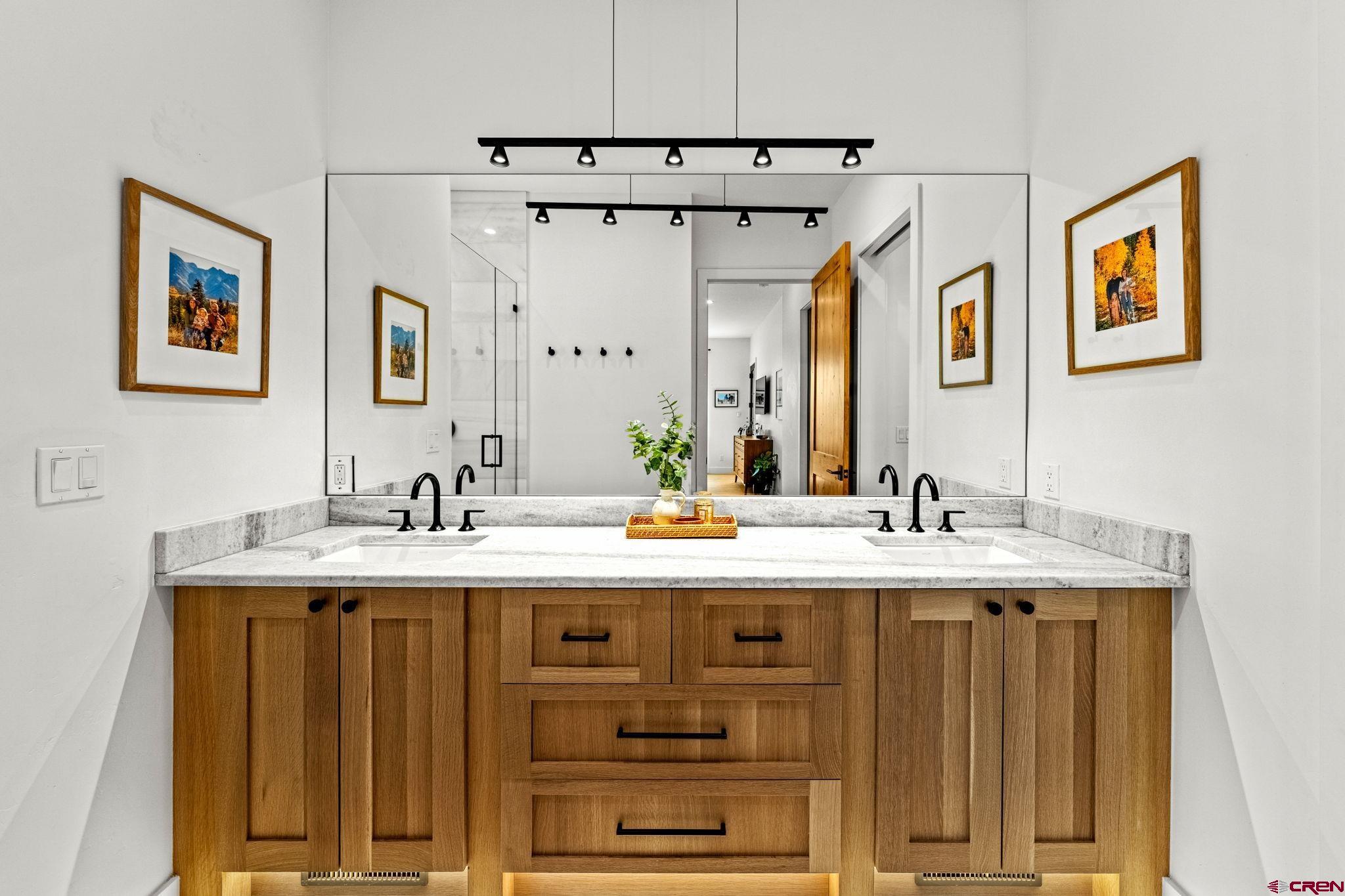 26 Boulder View Drive Durango, CO 81301 - Photo 26 of 45 a view of a bathroom with a sink and mirror
