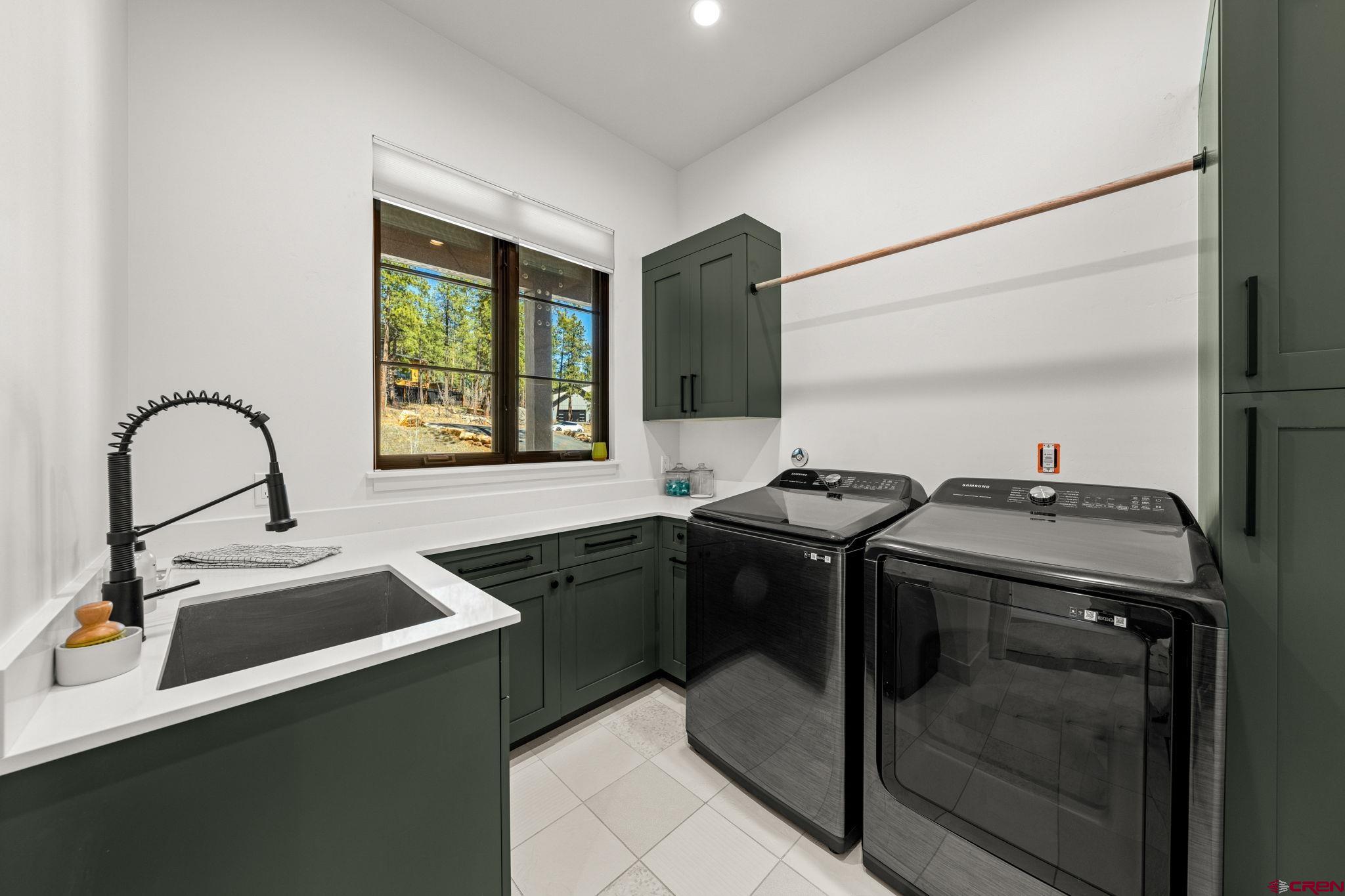 26 Boulder View Drive Durango, CO 81301 - Photo 29 of 45 a kitchen with a sink and a stove top oven