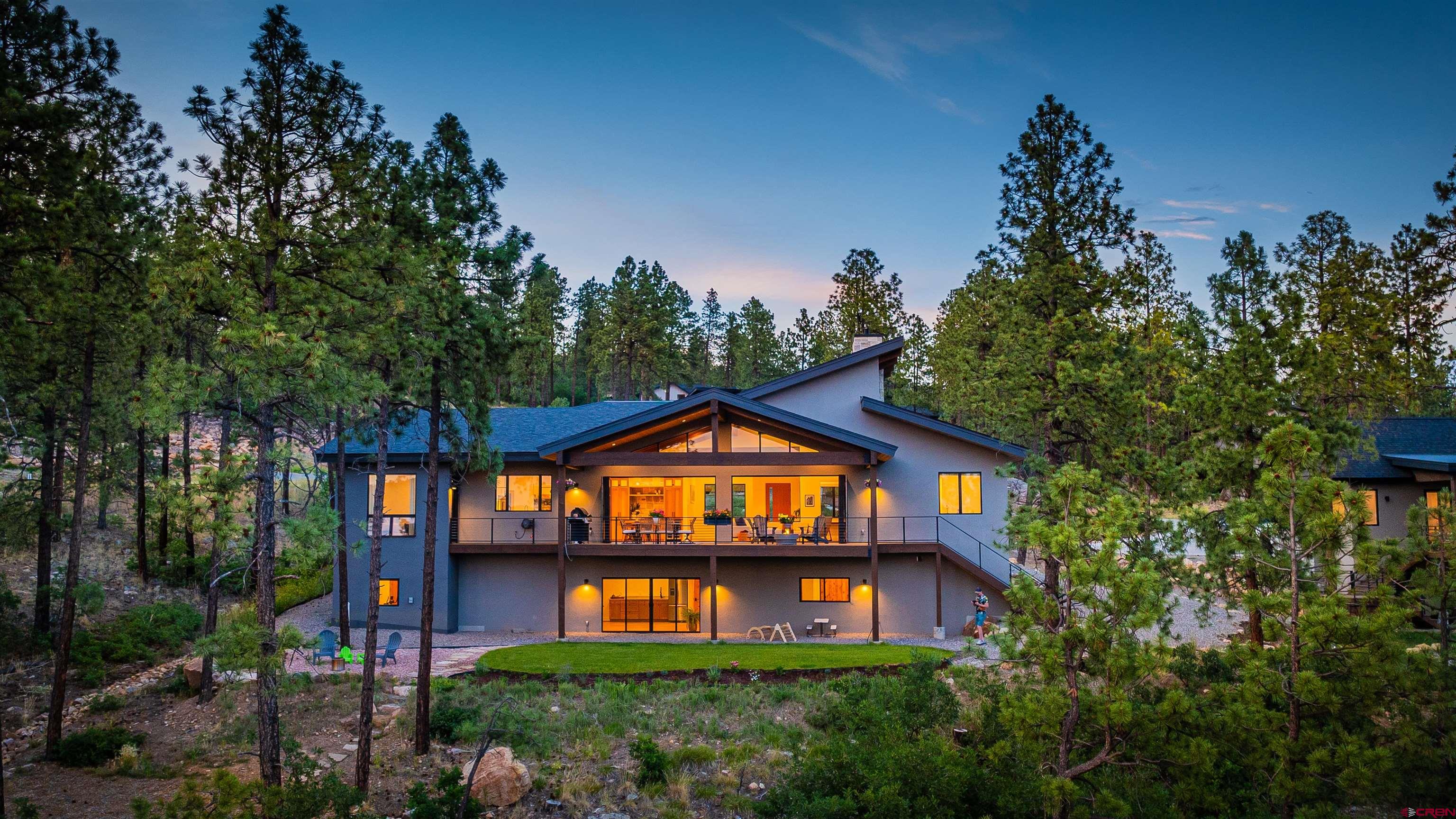 26 Boulder View Drive Durango, CO 81301 - Photo 3 of 45 a sign board with tree in the background