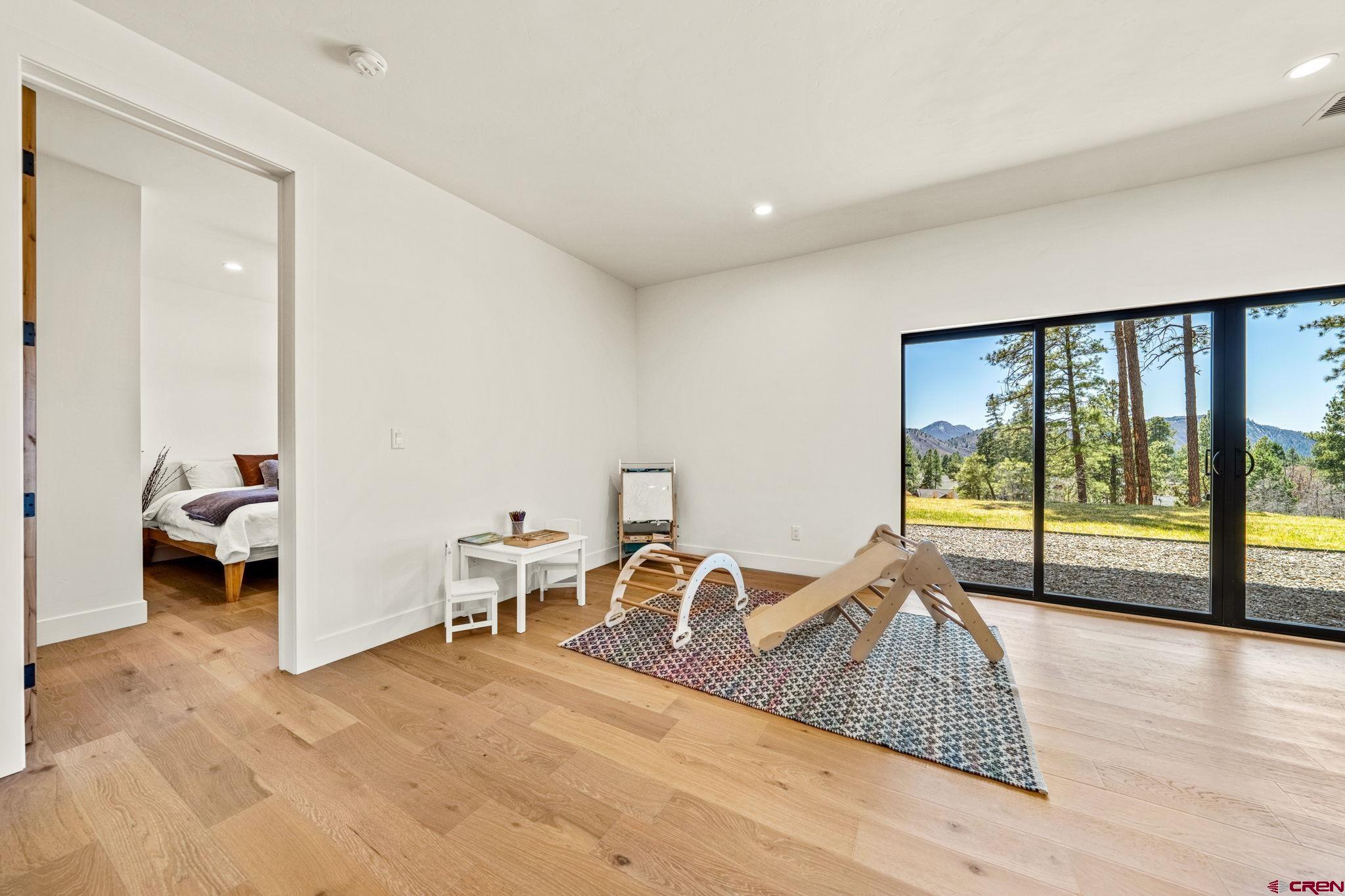 26 Boulder View Drive Durango, CO 81301 - Photo 37 of 45 a living room with furniture and a large window