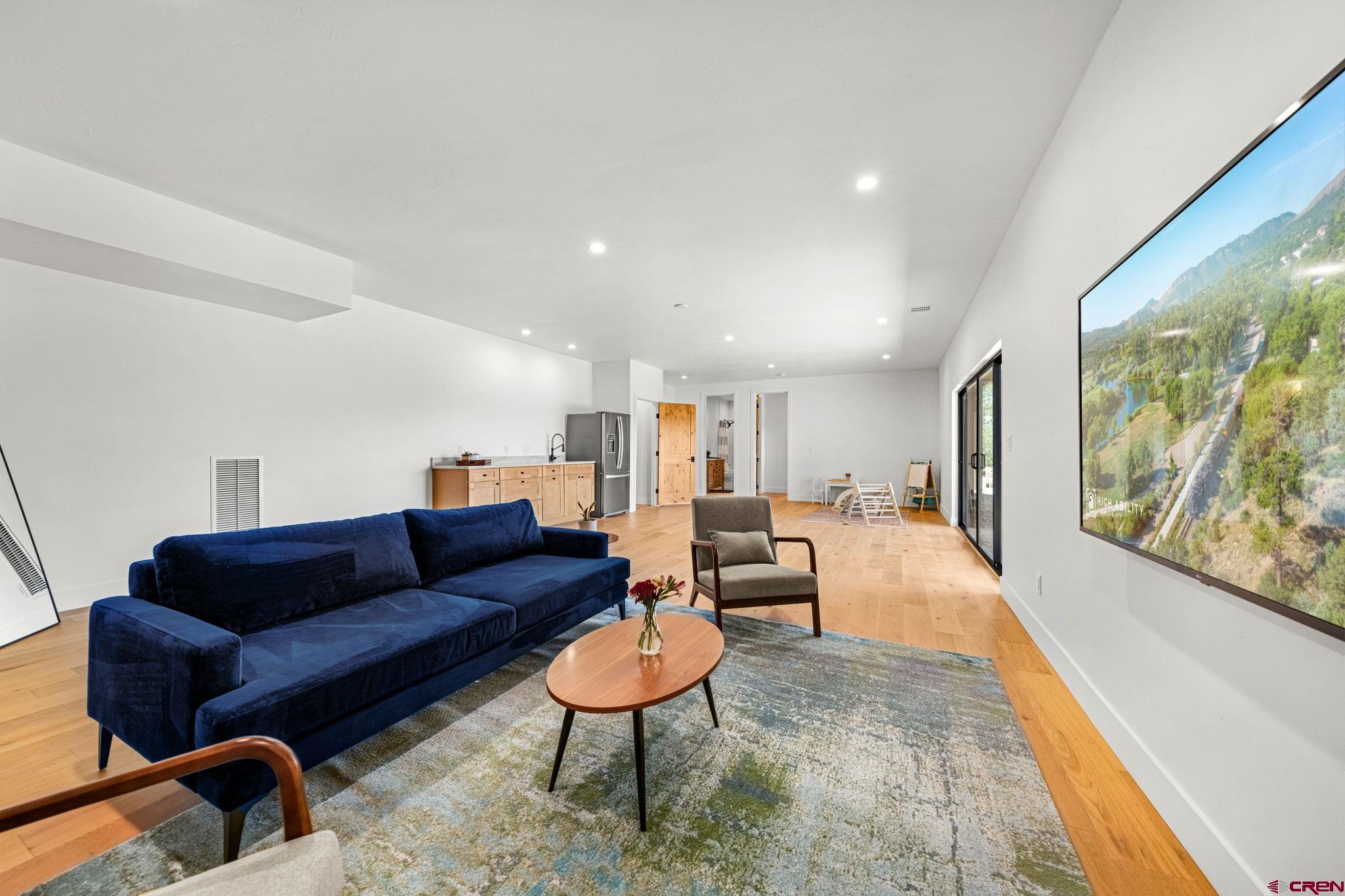 26 Boulder View Drive Durango, CO 81301 - Photo 39 of 45 a living room with furniture and a rug