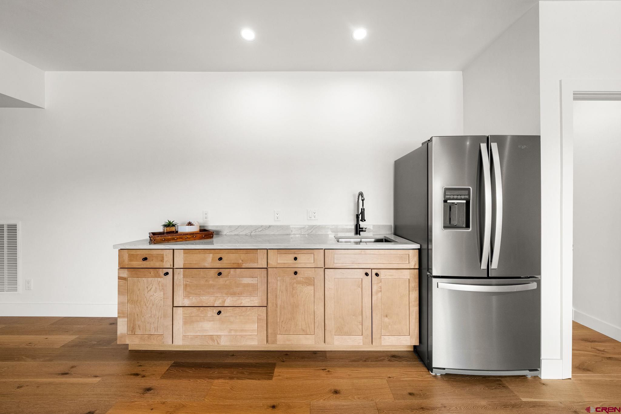 26 Boulder View Drive Durango, CO 81301 - Photo 40 of 45 a kitchen with stainless steel appliances granite countertop a refrigerator and a stove