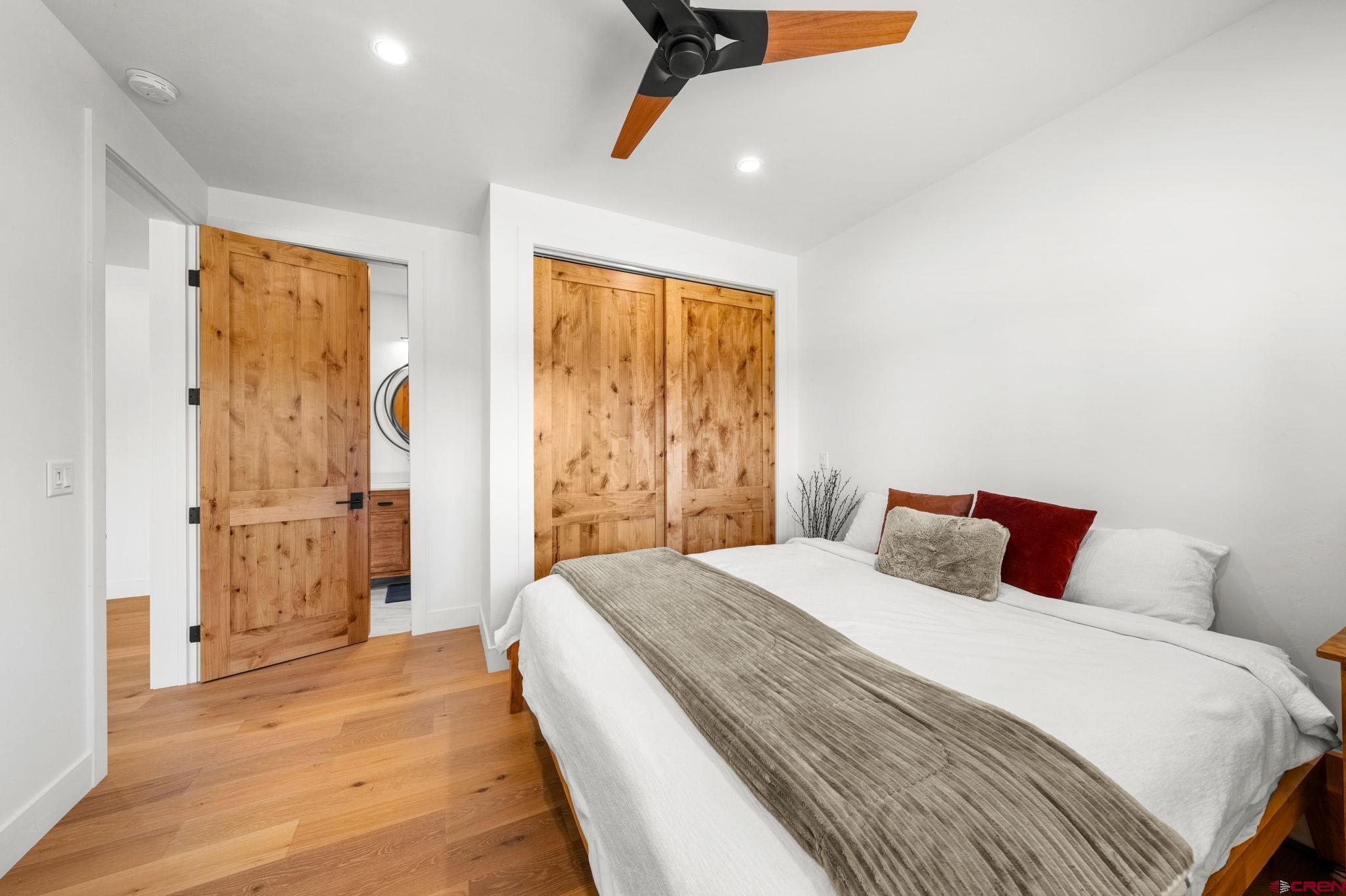 26 Boulder View Drive Durango, CO 81301 - Photo 43 of 45 a bedroom with a bed and a window