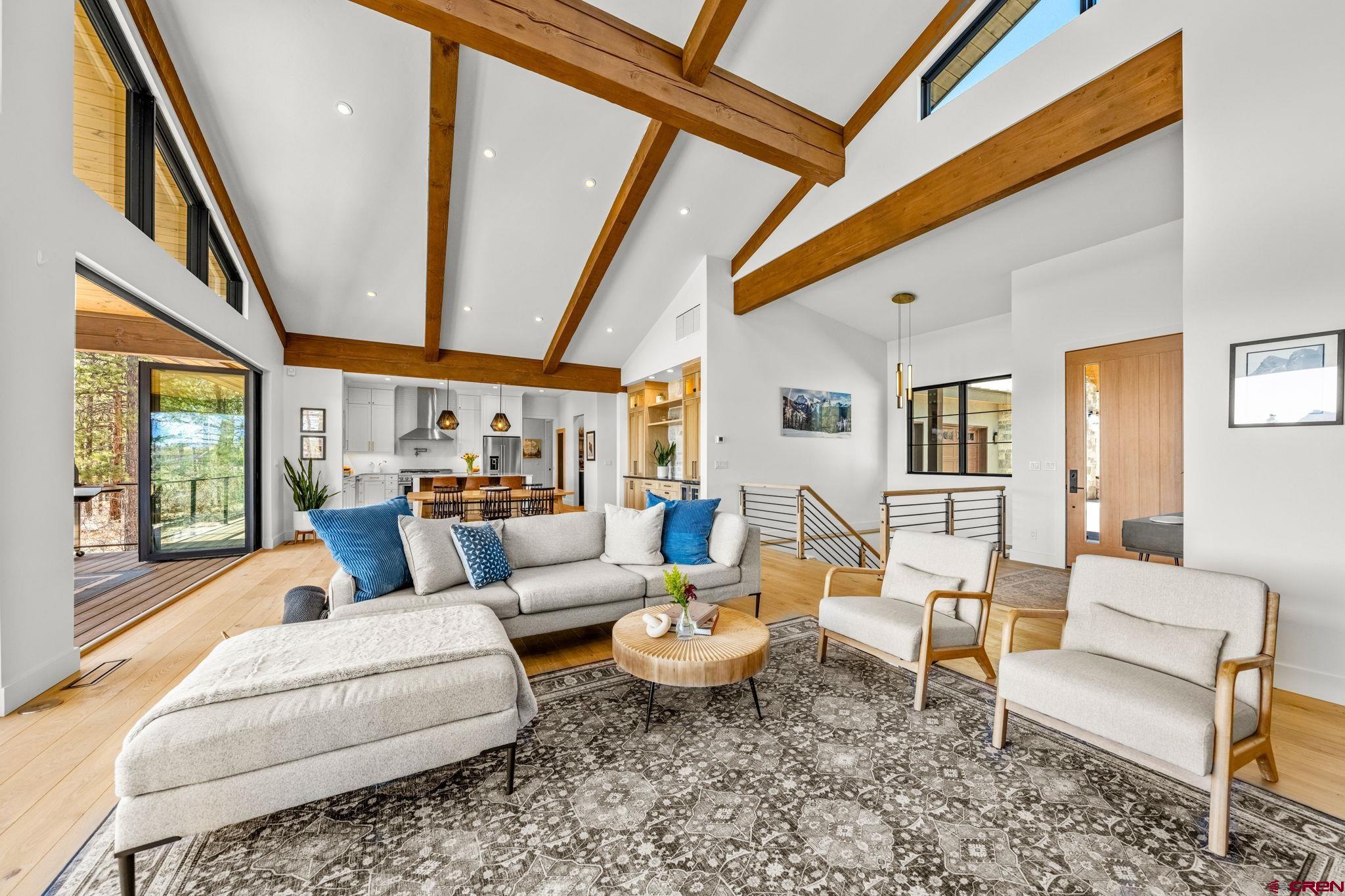 26 Boulder View Drive Durango, CO 81301 - Photo 9 of 45 a living room with furniture and a large window