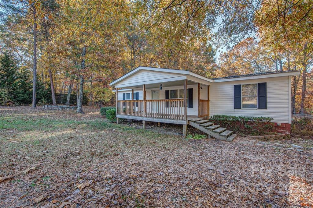 1349 Sherwood Road Clover, SC 29710 - Photo 1 of 23 a view of a house with yard and sitting area