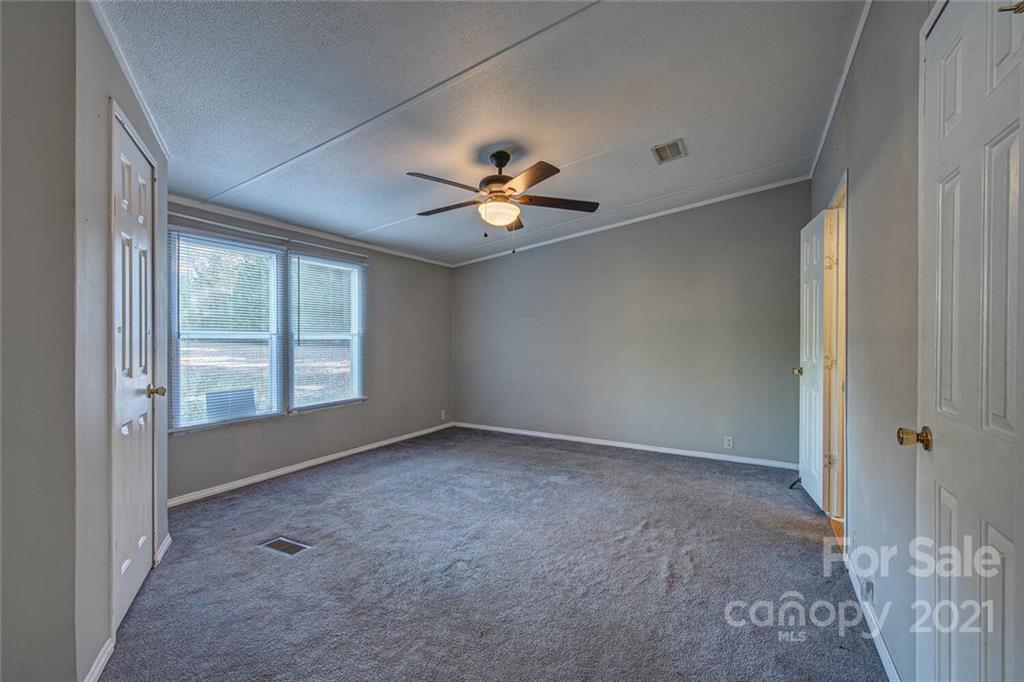 1349 Sherwood Road Clover, SC 29710 - Photo 12 of 23 a view of an empty room with a window
