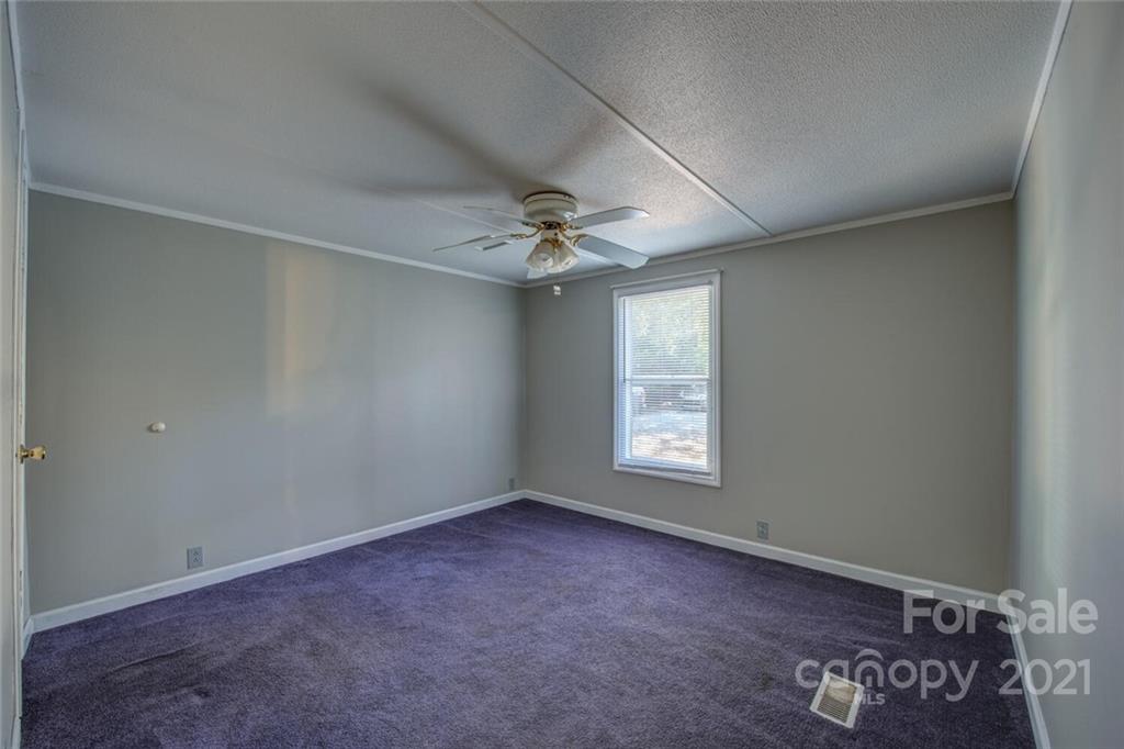 1349 Sherwood Road Clover, SC 29710 - Photo 16 of 23 a view of an empty room with a window
