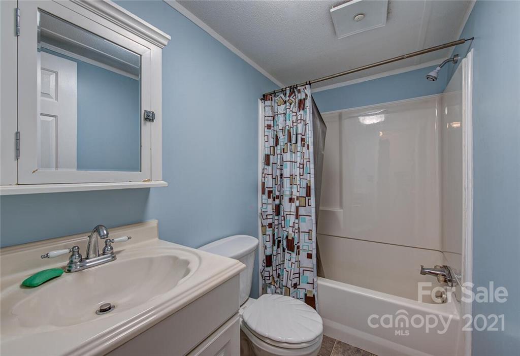 1349 Sherwood Road Clover, SC 29710 - Photo 17 of 23 a bathroom with a sink toilet and shower