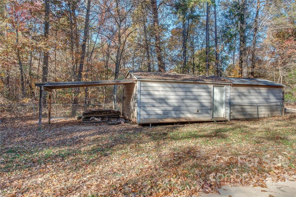 1349 Sherwood Road Clover, SC 29710 - Photo 22 of 23 a view of backyard with wooden fence
