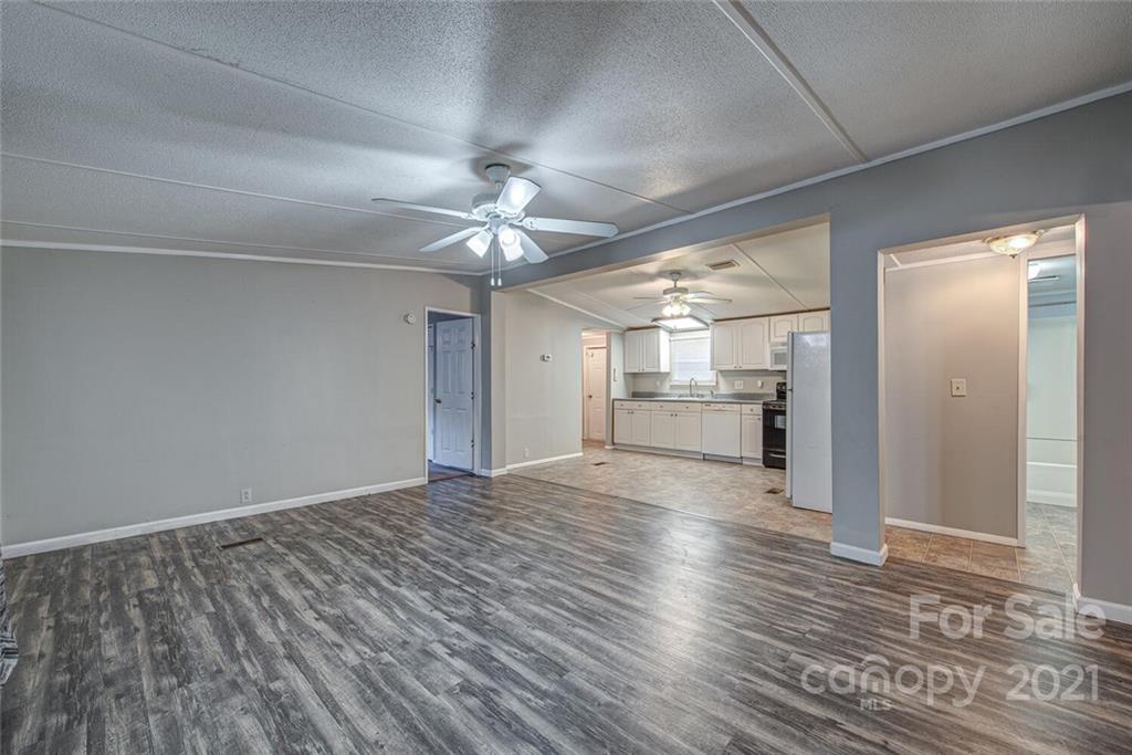 1349 Sherwood Road Clover, SC 29710 - Photo 8 of 23 wooden floor in an empty room with a window