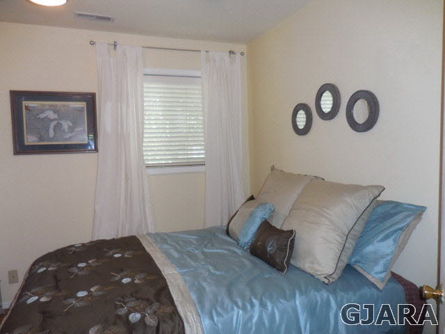 3581 G Road Palisade, CO 81526 - Photo 13 of 41 a bedroom with a bed and a window