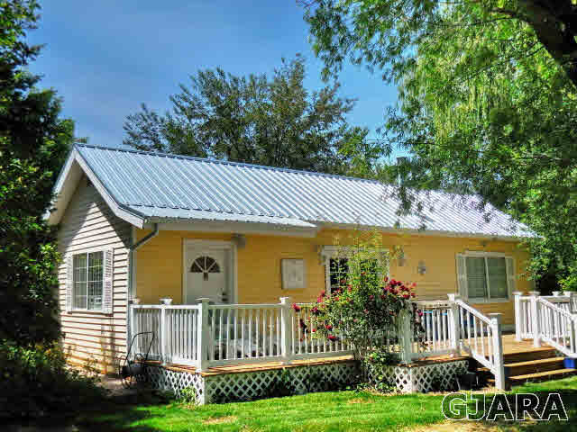 3581 G Road Palisade, CO 81526 - Photo 2 of 41 a view of a house with a yard
