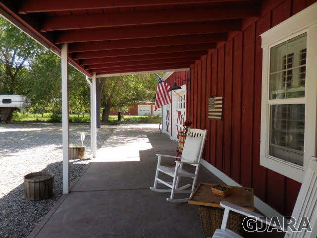 3581 G Road Palisade, CO 81526 - Photo 22 of 41 a patio with table and chairs