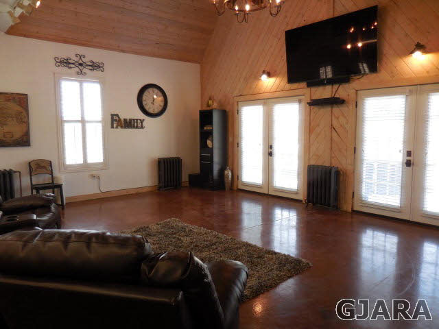 3581 G Road Palisade, CO 81526 - Photo 23 of 41 a room with furniture and a flat screen tv