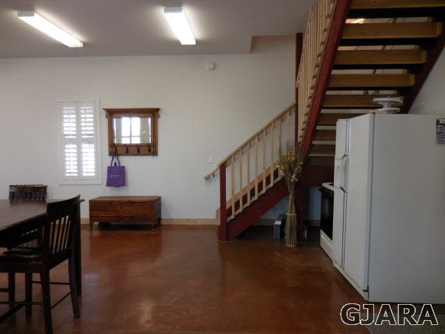 3581 G Road Palisade, CO 81526 - Photo 26 of 41 a livingroom with furniture staircase and a window