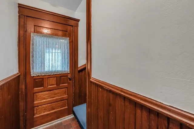 a view of a kitchen with furniture and window