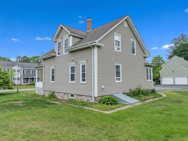 a picture of a bench in front of a wall