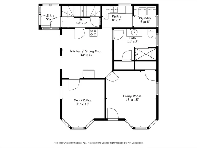 a picture of a bench in front of a wall