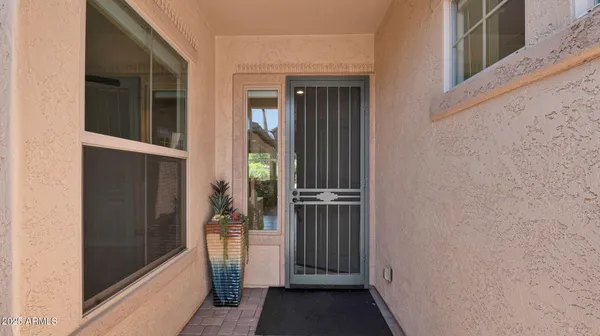 wooden floor with white walls