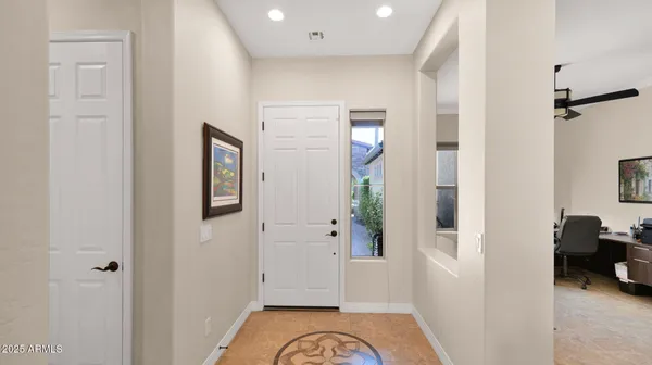 a workspace with furniture and a window