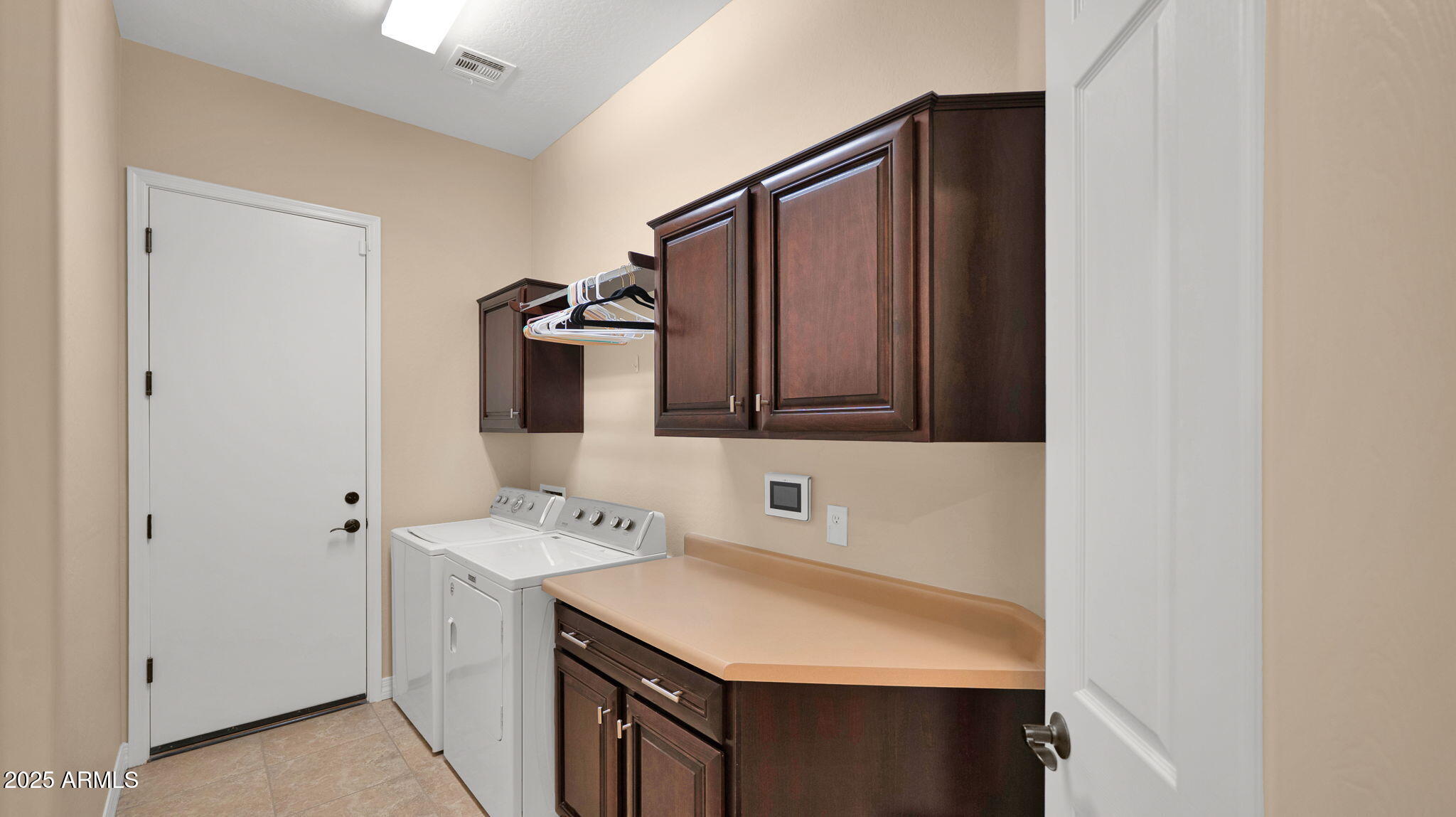 12981 West Yellow Bird Lane Peoria, AZ 85383 - Photo 15 of 47 a bathroom with a sink and a mirror