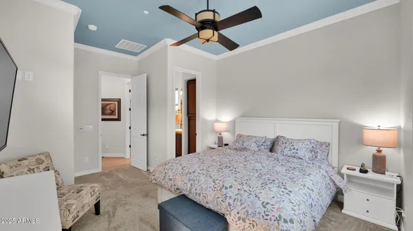 a bathroom with a toilet a sink and shower