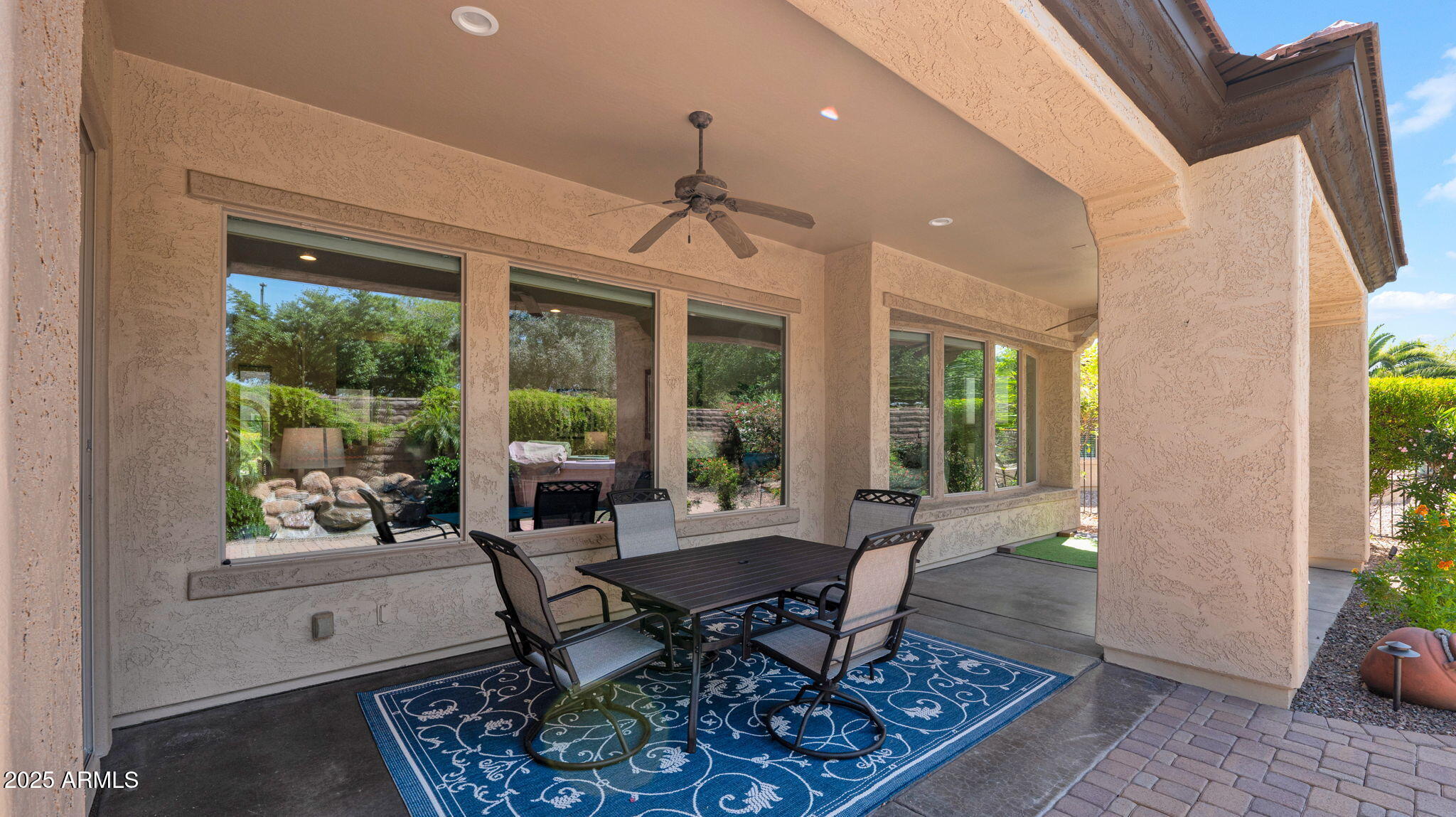 12981 West Yellow Bird Lane Peoria, AZ 85383 - Photo 38 of 47 a living room with furniture and a window