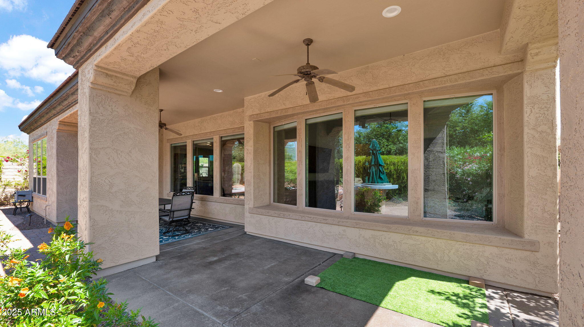 12981 West Yellow Bird Lane Peoria, AZ 85383 - Photo 45 of 47 a view of a entryway door front of house