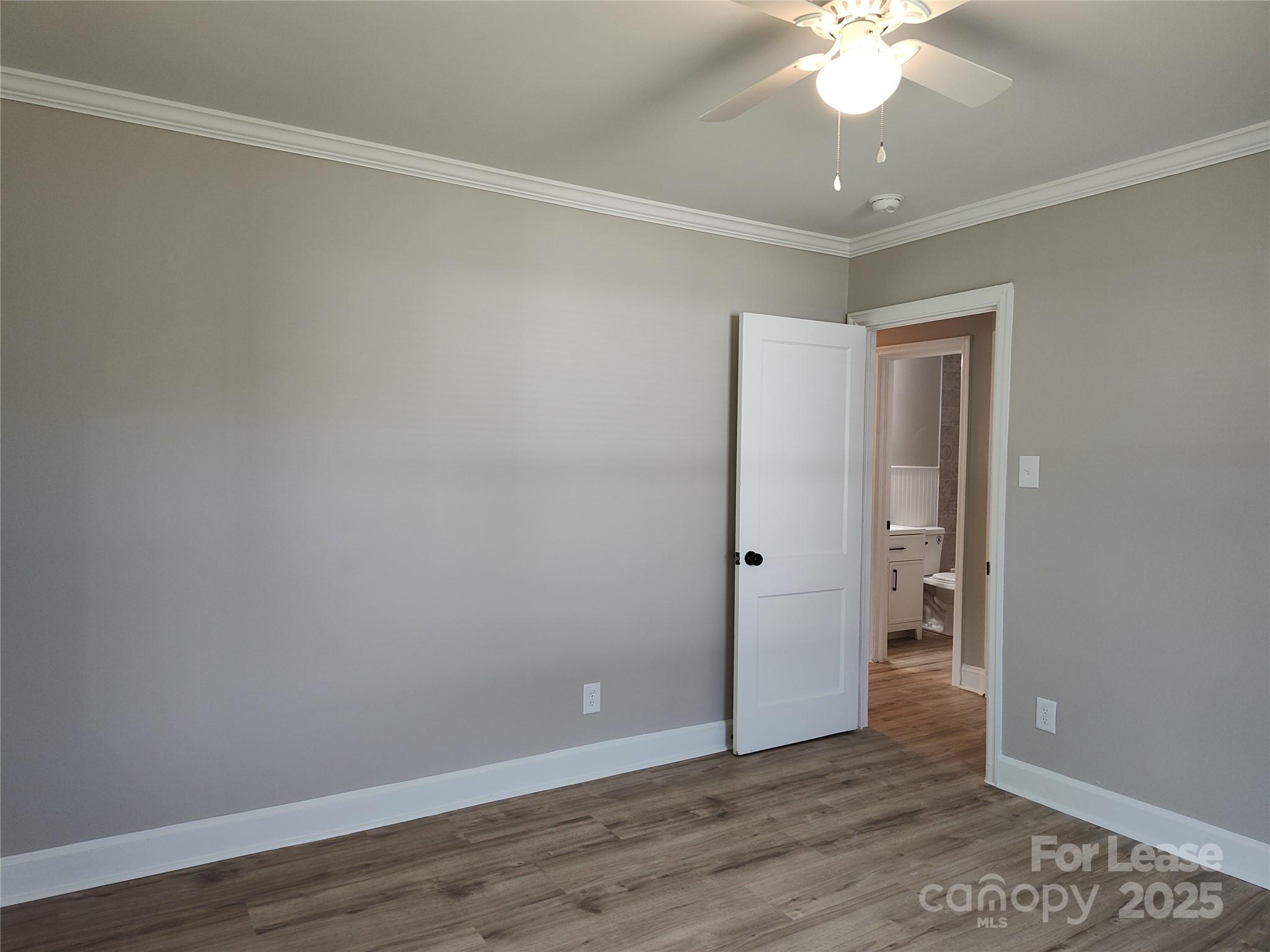 1239 Bose Avenue Rock Hill, SC 29732 - Photo 11 of 18 a view of an empty room with wooden floor