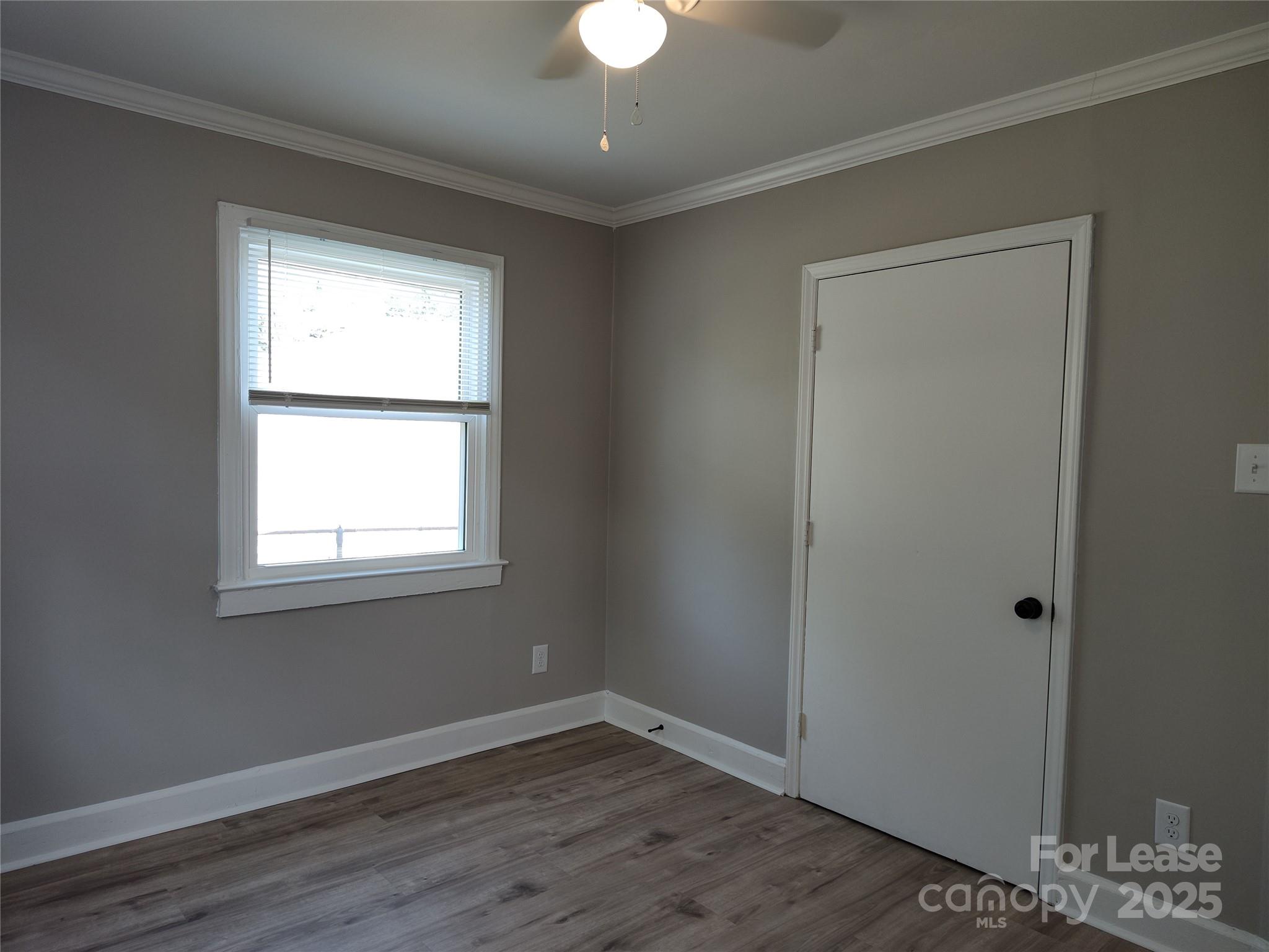 1239 Bose Avenue Rock Hill, SC 29732 - Photo 14 of 18 wooden floor in an empty room with a window