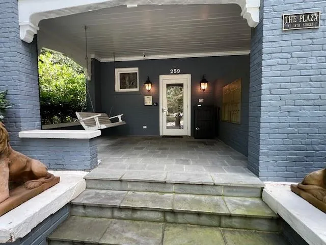 a view of a backyard of the house