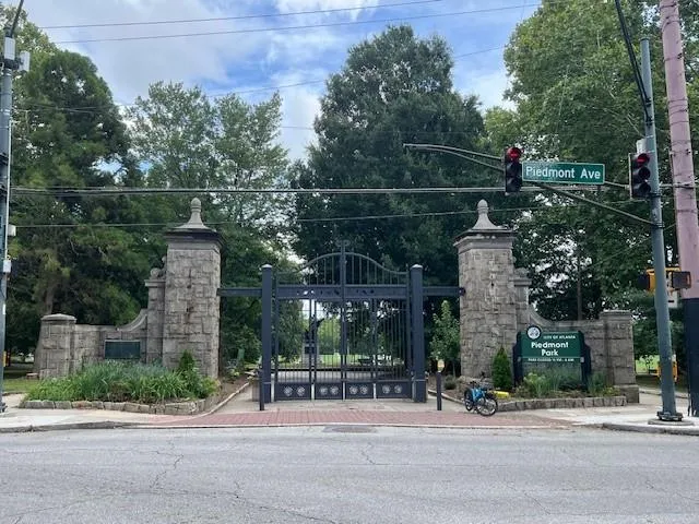 a sign that is sitting on a wooden wall