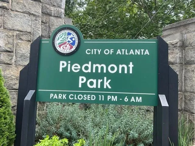 a view of a patio with a table and chairs and potted plants