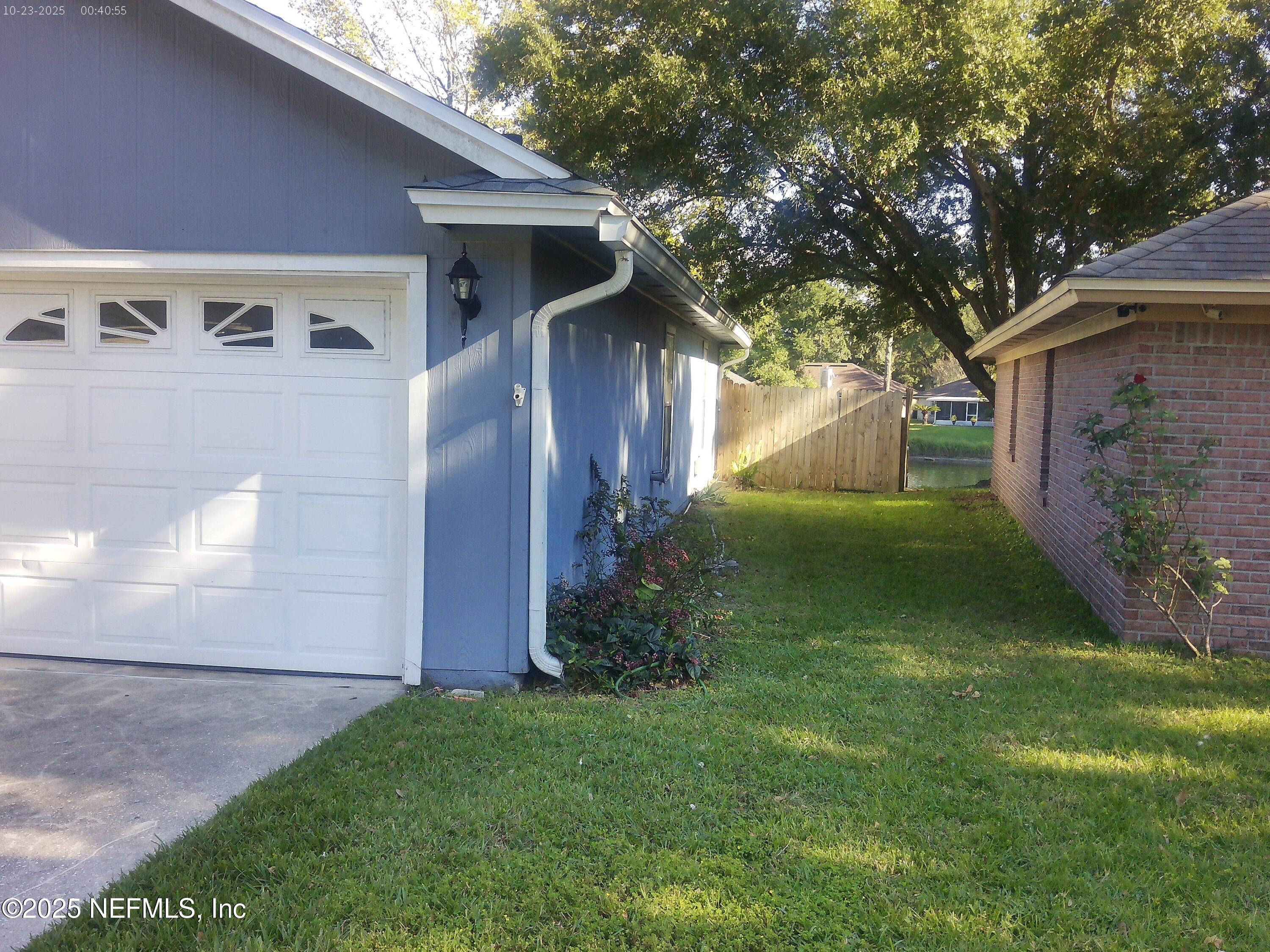 1641 Spring Oaks Lane Jacksonville, FL 32221 - Photo 5 of 24 a view of a back yard of the house