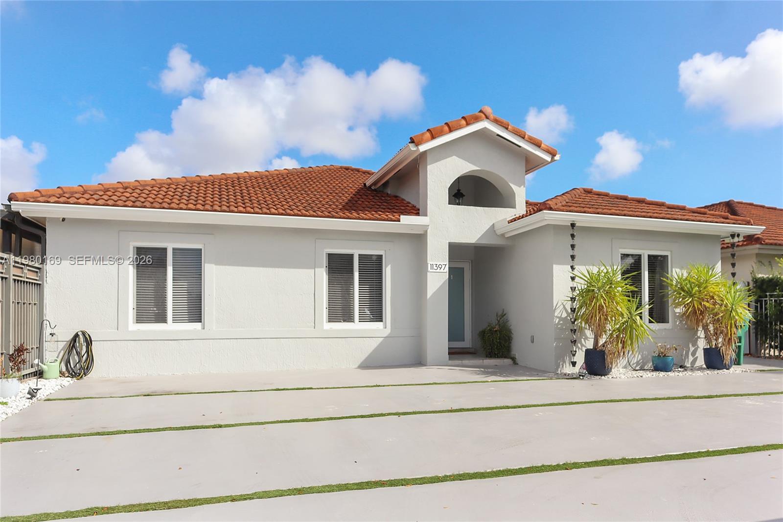 11397 Southwest 185th Terrace Miami, FL 33157 - Photo 2 of 15 front view of a house