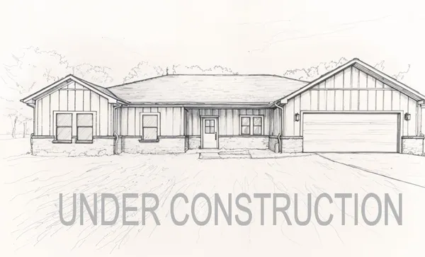 a kitchen with kitchen island granite countertop a sink and stainless steel appliances