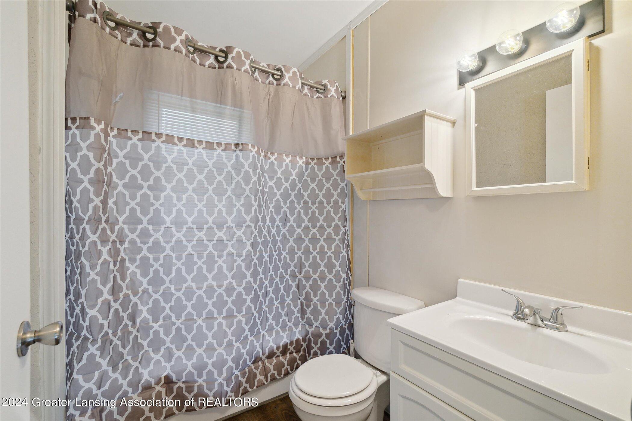 1821 West Jolly Road Lansing, MI 48910 - Photo 13 of 23 13-1821-W-Jolly-Rd-Lansing-MI-48910-Wind
