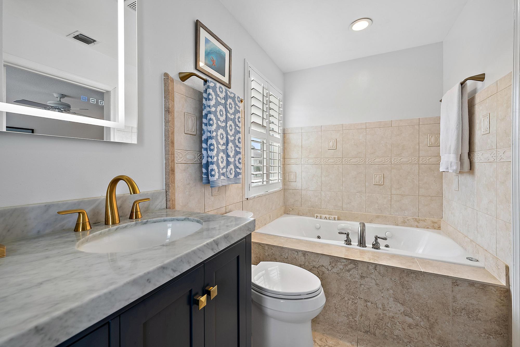 149 Stonebriar Boulevard Jupiter, FL 33458 - Photo 18 of 42 Primary Bath