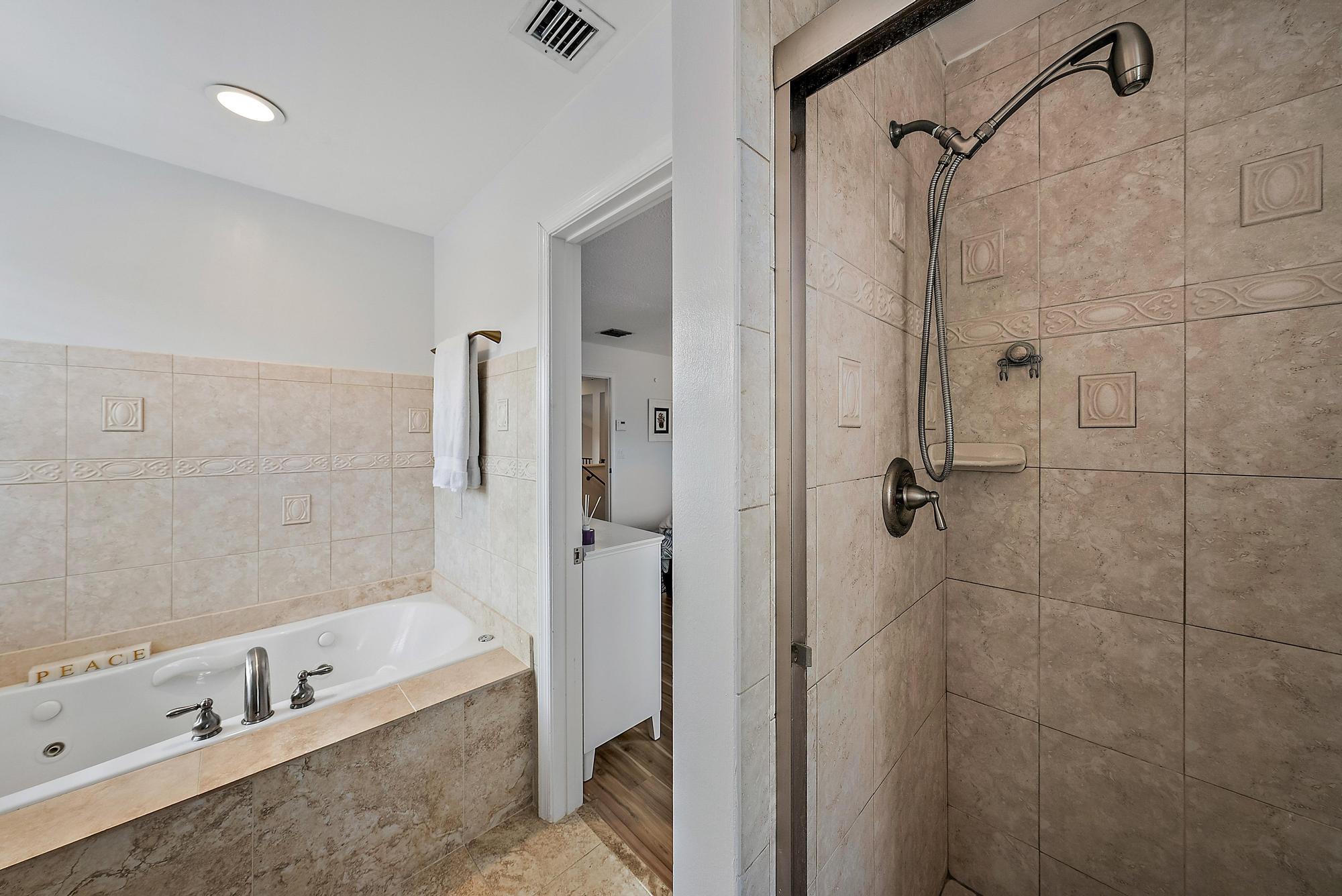 149 Stonebriar Boulevard Jupiter, FL 33458 - Photo 19 of 42 Primary Bath