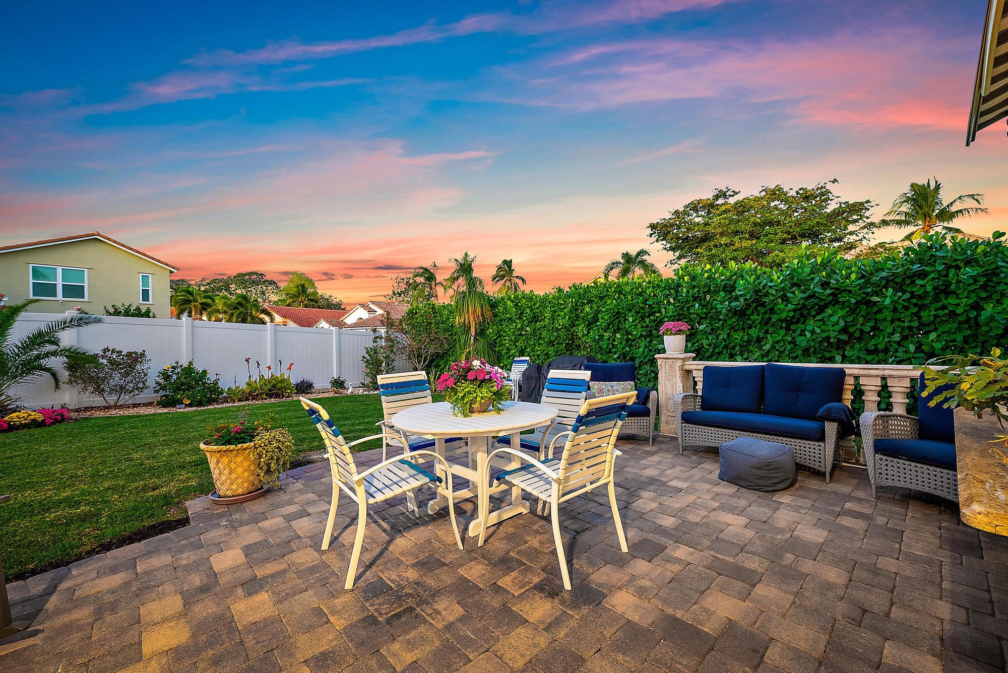 149 Stonebriar Boulevard Jupiter, FL 33458 - Photo 35 of 42 Patio & Backyard