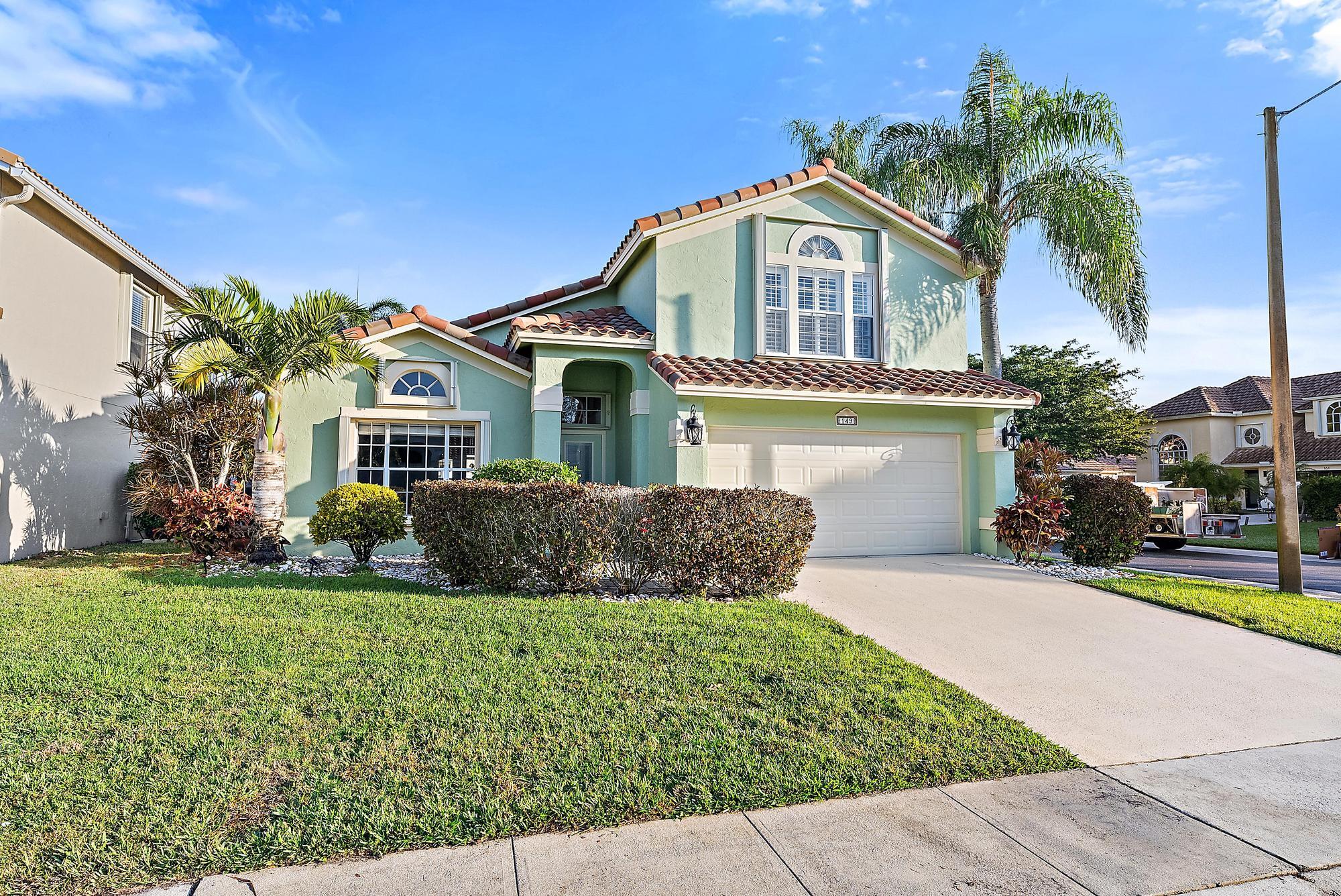 149 Stonebriar Boulevard Jupiter, FL 33458 - Photo 36 of 42 Front Exterior