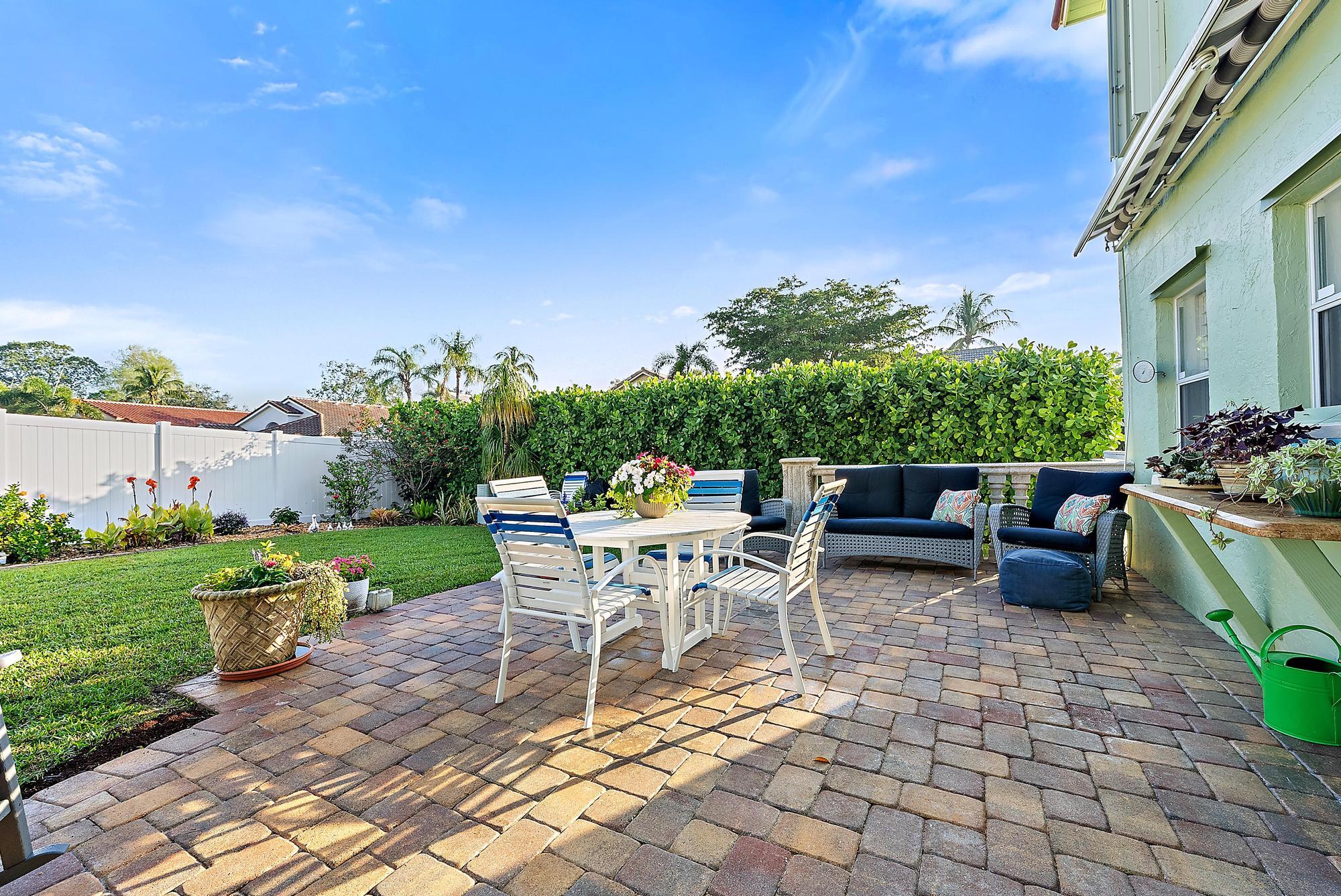 149 Stonebriar Boulevard Jupiter, FL 33458 - Photo 39 of 42 Patio & Backyard