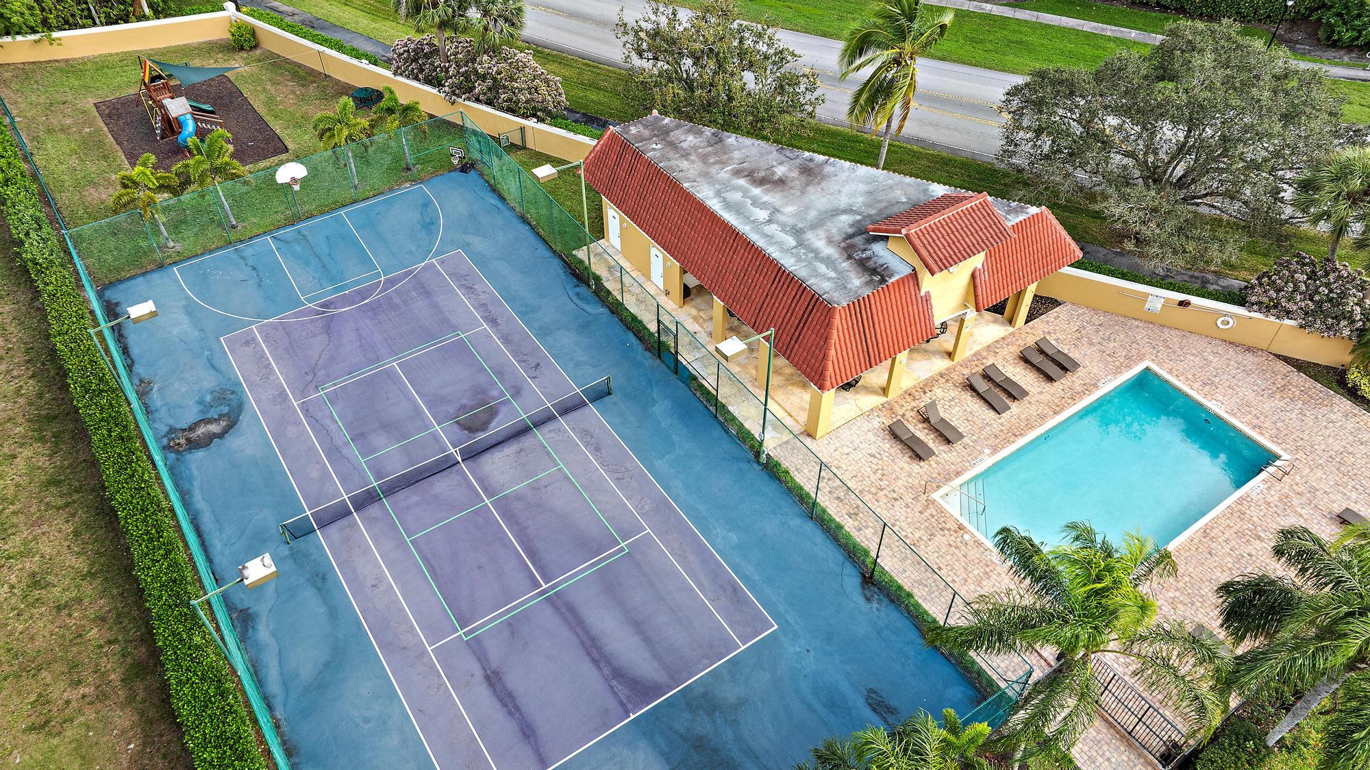 149 Stonebriar Boulevard Jupiter, FL 33458 - Photo 42 of 42 Tennis Court