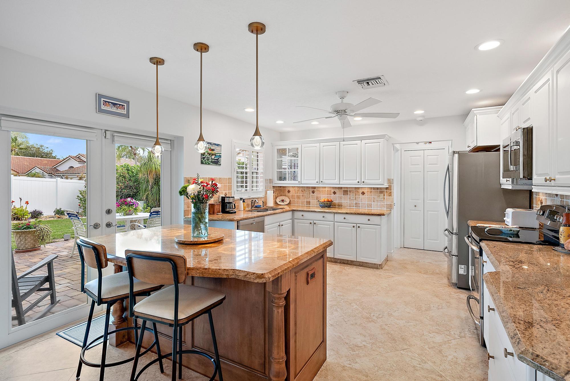 149 Stonebriar Boulevard Jupiter, FL 33458 - Photo 9 of 42 Kitchen