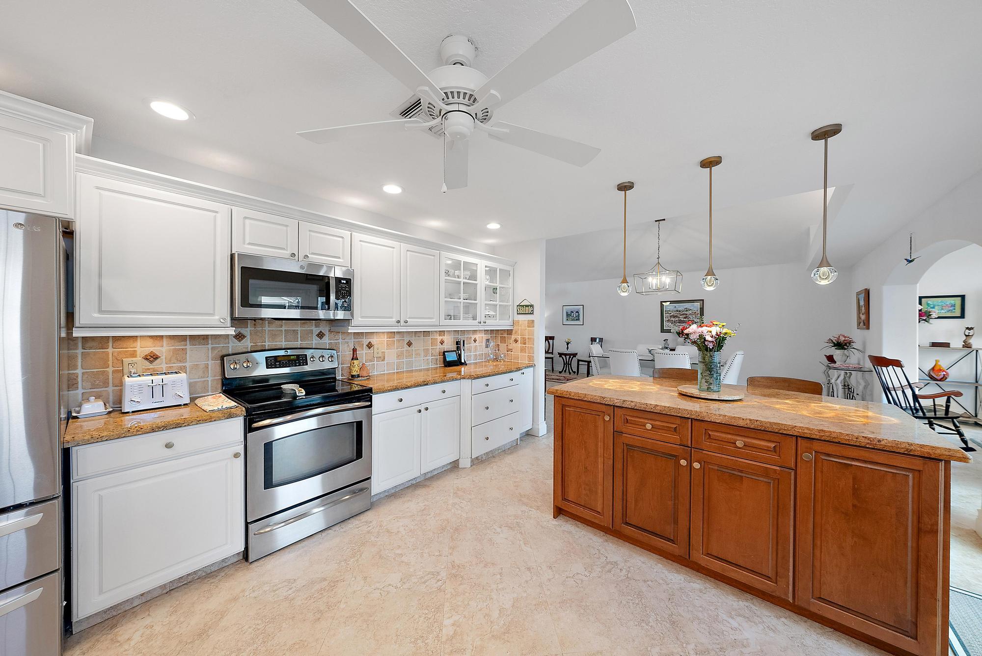 149 Stonebriar Boulevard Jupiter, FL 33458 - Photo 10 of 42 Kitchen