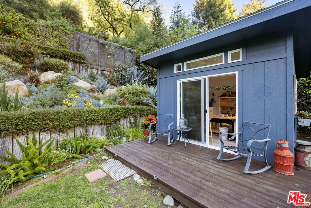 2618 Mandeville Canyon Road Los Angeles, CA 90049 - Photo 35 of 45 a view of house with outdoor seating space