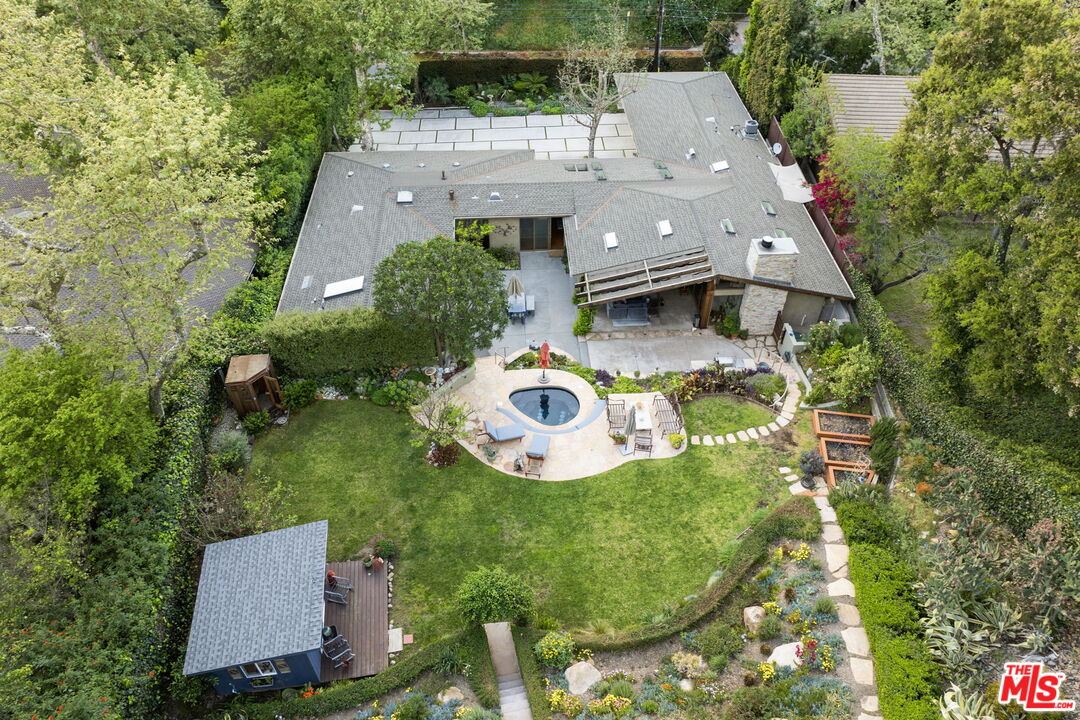 2618 Mandeville Canyon Road Los Angeles, CA 90049 - Photo 44 of 45 an aerial view of a house with yard swimming pool and outdoor seating