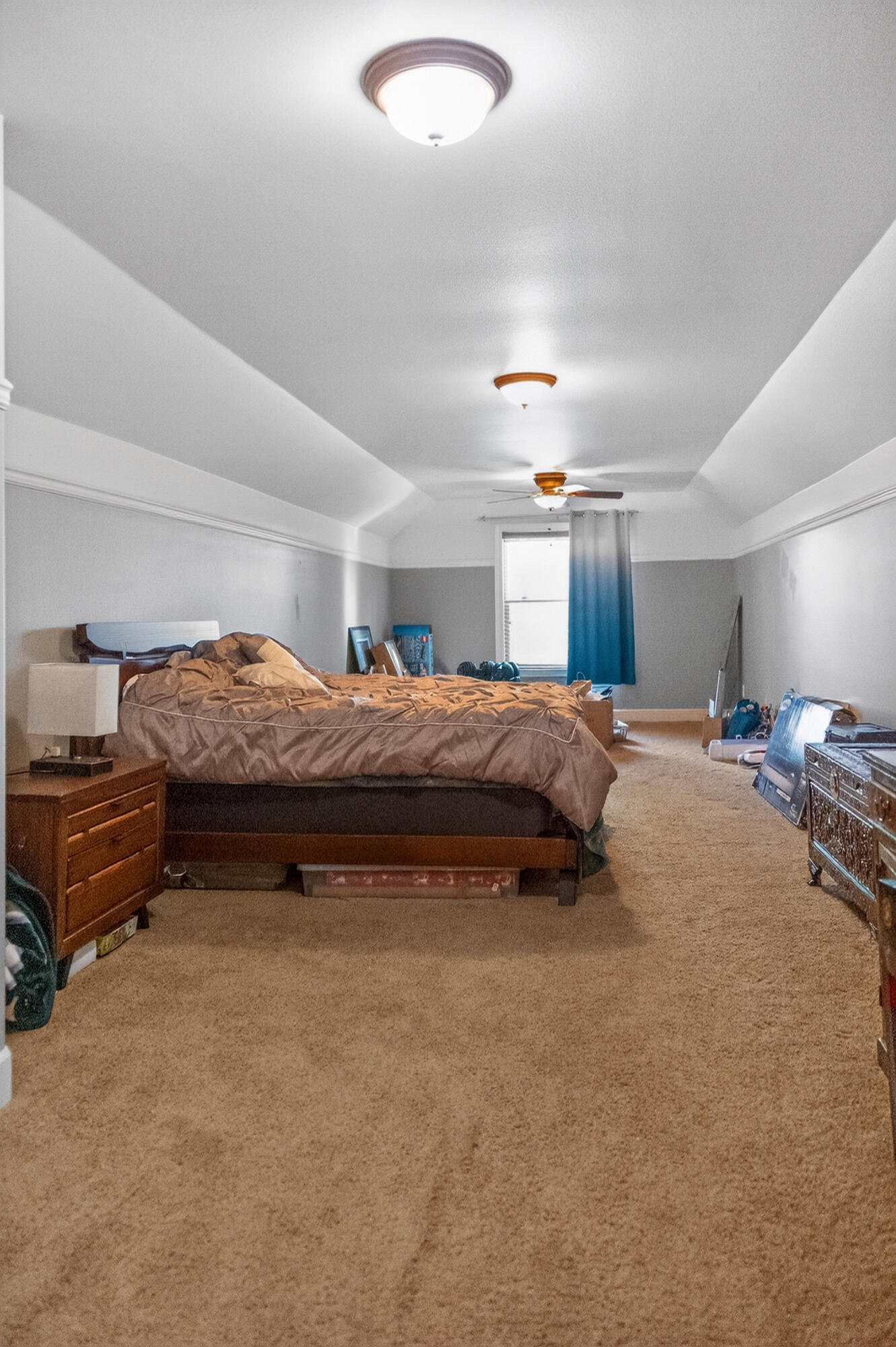 10421 Kestrel Road Klamath Falls, OR 97601 - Photo 46 of 56 a bedroom with a bed and a chandelier