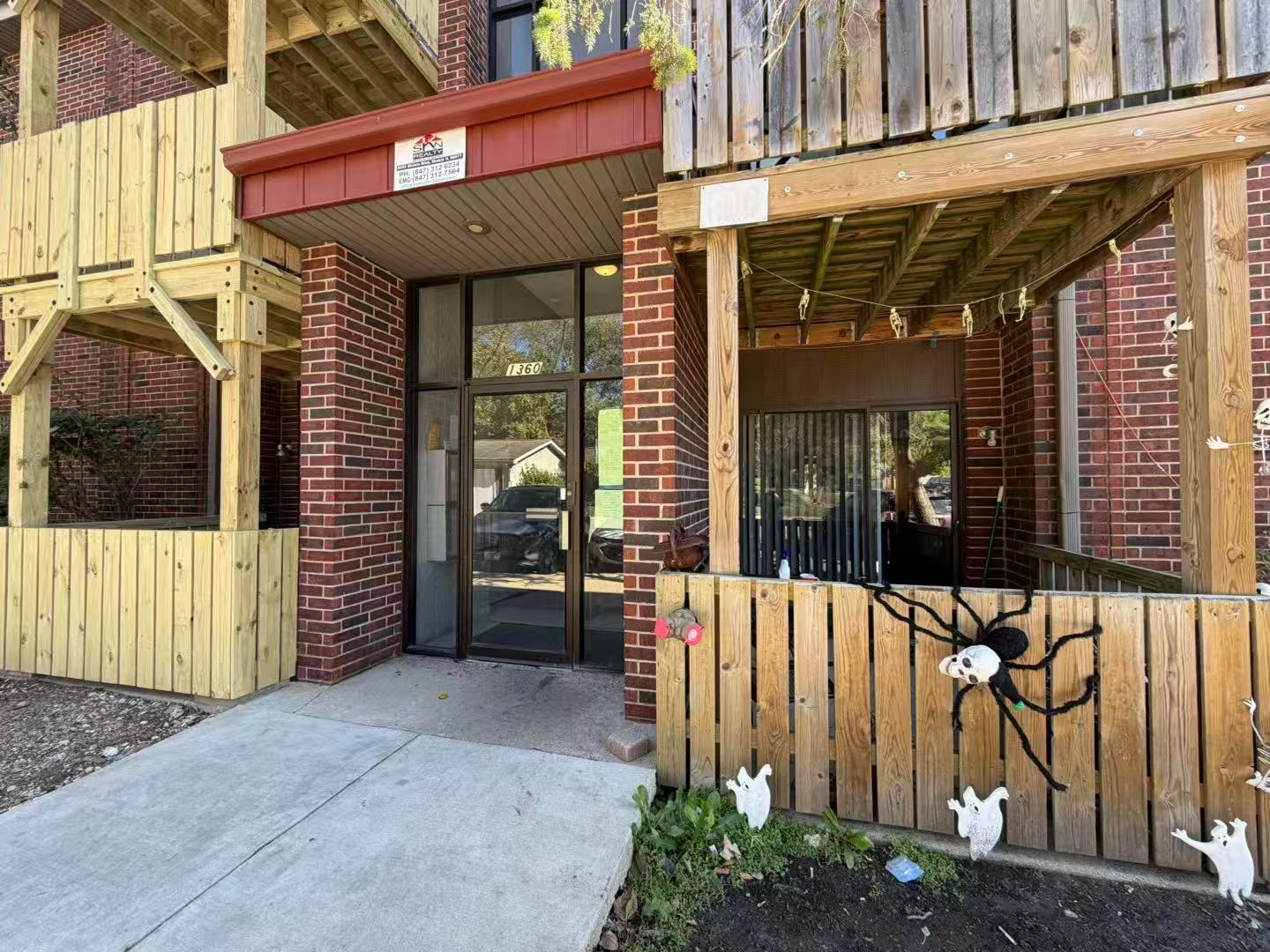 1360 Brook Street, Unit F St. Charles, IL 60174 - Photo 4 of 18 a view of a porch with a table and chairs