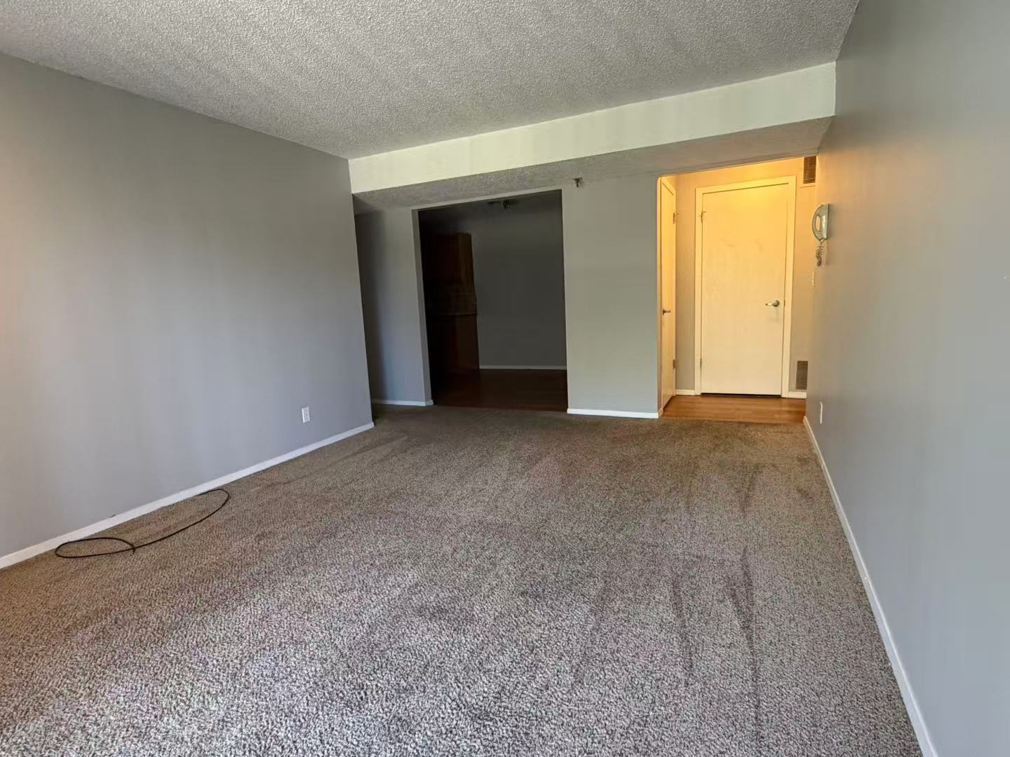 1360 Brook Street, Unit F St. Charles, IL 60174 - Photo 6 of 18 a view of an empty room with window